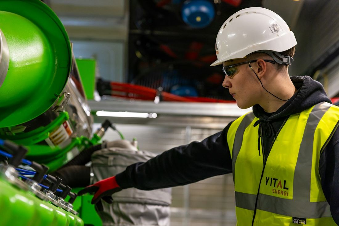 Safety-focused operations personnel wearing certified protective equipment